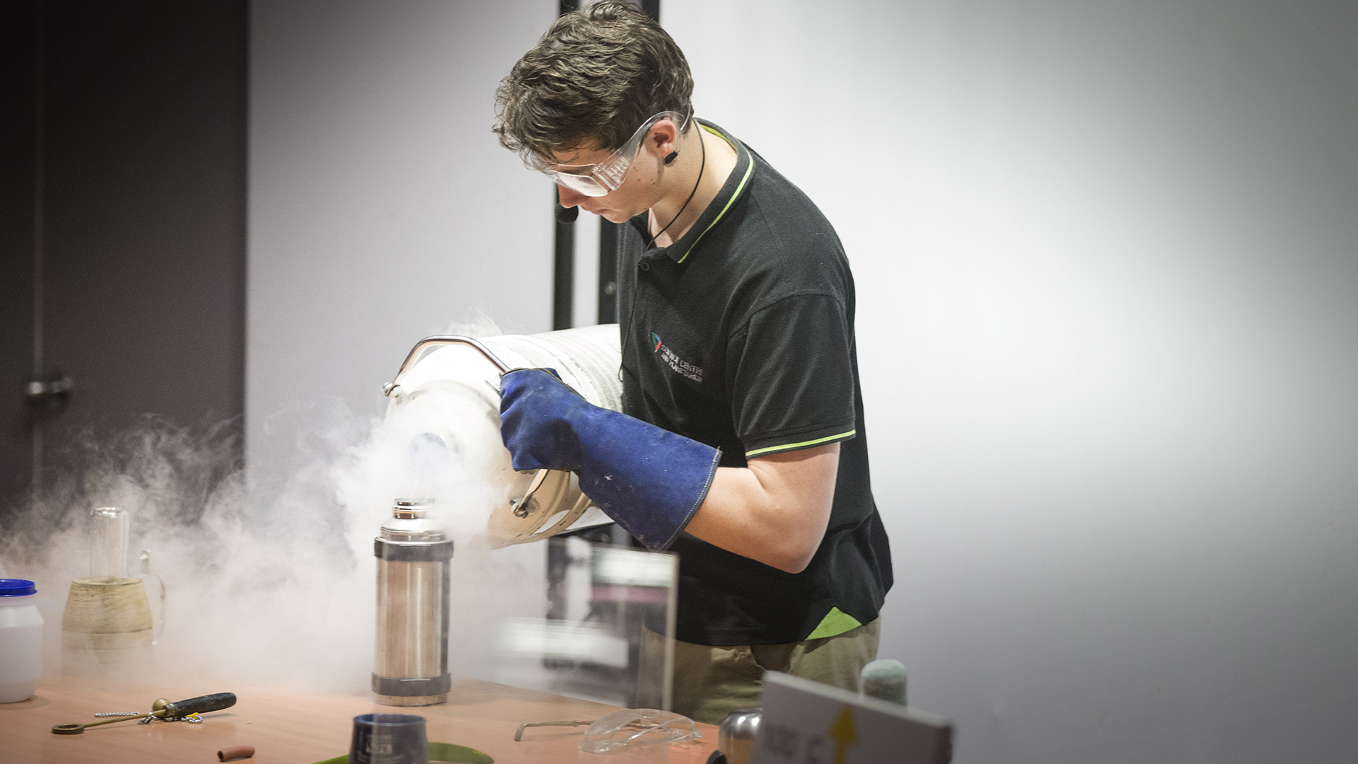 Man in protective gear experimenting with Liquid Nitrogen